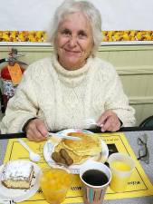 Delicious pancakes are a tradition at the Highland Mills United Methodist Church. Long-time member Frances Van Etten of Highland Mills enjoyed the hearty fare at a recent breakfast. The next one will be on Saturday, Oct. 19th. All are invited.