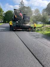 The Monroe Highway Department recently completed repaving six town road. The town expects to pave a portion of Larkin Drive in September. Photo provided by the Town of Monroe.