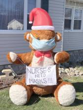 Donna Angrisani shared this photo she took of my friend bear on her front lawn in Monroe to raise consciousness - and perhaps even donations - about the medical supply shortage at health care facilities in this time of the coronavirus. My daughter is a nurse so this is why I am getting involved, Angrisani said. The gloves can go to any hospital. Thanks and stay well.