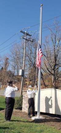 Monroe. American Legion Post 488 dedicates new Barnett Hills Condo flagpole