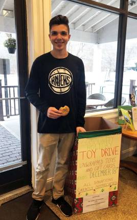 Provided photosAndrew Hekl, a member of the National Honor Society at George F. Baker High School in Tuxedo, delivers a Toy Drive box to Dottie Audrey&#x2019;s Bakery Kitchen in Tuxedo Park.