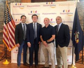 Assemblyman Ken Zebrowski (D-Rockland), state Sen. James Skoufis (D-Hudson Valley), Aaron Fried, Harper's father and co-founder of HarperSmiles, and Monroe Town Supervisor Anthony Cardone announce the Governor has signed Harper's Law.
