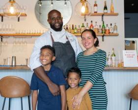 An Artistic Taste’s owner Chef Andre Robinson with his wife, Norise, and children, Andre and Oliver. Photo provided.