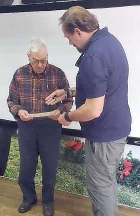 Veteran Jerome DiSisto with Wreaths Across America Mobile Education Exhibit Ambassador Stefan Brann during the museum’s stop last week at the Central Valley Fire House.