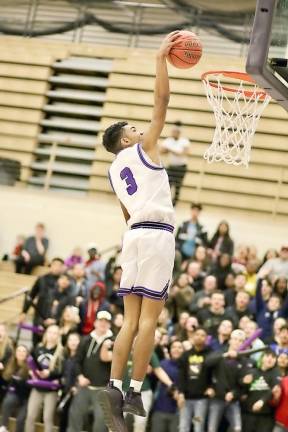 Senior Josh Castro brought the Crusader fans to their feet with this dunk.