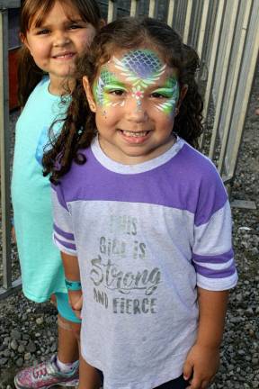 Face-painting was among the family-friendly activities during the three-day carnival of caring.