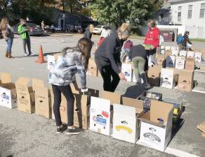The Monroe Food Pantry provided holiday boxes at both Thanksgiving and Christmas to more than 75 families. Provided photos.