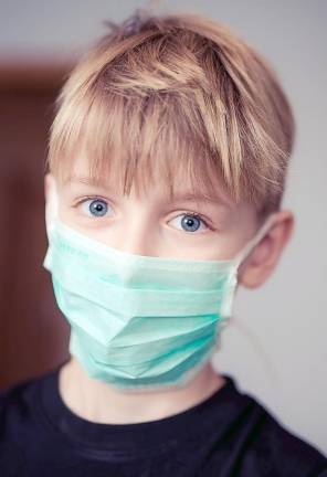 Orange County Health Commissioner Dr. Irina Gelman has issued an order mandating that masks be worn in all Orange County schools upon returning to school during the ongoing COVID-19 pandemic. Photo by Janko Ferlic from Pexels.