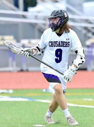 Jake Caprara scored two goals and added an assist to help the Crusaders slay the Dragons.
