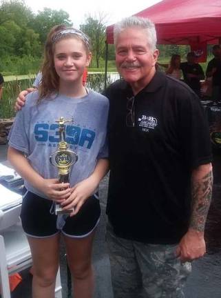 Photo provided by B&amp;B Archery Amanda Krocian of Monroe won first place in this year's Scholastic 3-D Archery Girl's Division. She is pictured her with her instructor Nick Nobile of B&amp;B Archery