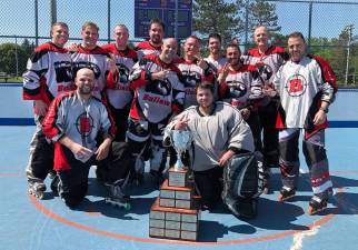 The Silver Bullets are Monroe Roller Hockey Adult League Champions for the second year in a row. Pictured are: Nick Benincasa, Jason Berman, John Bambauer, Bill Carey, Brian Chorney, Matt Daley, Sam Enright, Rob Favara, Mike Geraci, Anthony Navarro, Danny O'Neill and Steve Summo.
