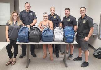 Contributions from the community and local businesses enabled the Monroe PBA to able to buildout more than 40 backpacks with back-to-school supplies. Photos provided by the Monroe PBA.