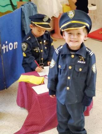 Officers Declan Gaffny and Tyler Dawson of Mrs. Kathi Brennan's class keep the peace.
