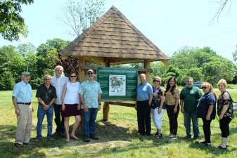 Attending the dedication of the Moodna Creek Watershed Intermunicipal Council’s (MCWIC) first wetland information kiosk at Earl Reservoir Park in the Town of Woodbury last Thursday were Cornwall Mayor Brendan Coyne, Vice Chairman of MCWIC; Ed Sims, MCWIC Representative from the Town of Montgomery; Andy Lawrence, Friends of Walton Lake; Kelly Morris, MCWIC Secretary; Jay Beaumont, MCWIC Chairman; Town of Woodbury Supervisor Frank Palermo; Woodbury Parks Commissioner Willa Fre]