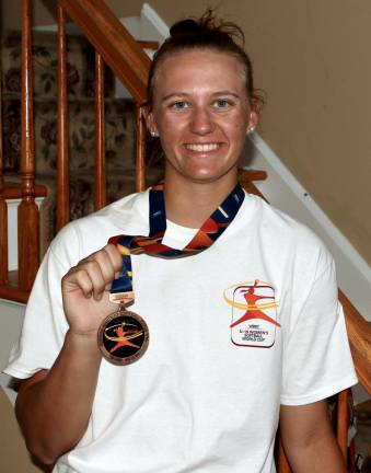 Samantha Ryan at home with her bronze medal that she helped the Canadian U-19 team win.
