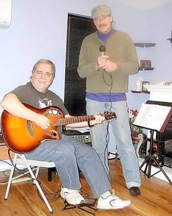 Guitarist Bob Montalbano and vocalist Jody Kopec rehearse for the Musical Coffee House on Saturday, Feb.15, at the First Presbyterian Church in Goshen. “Come, listen to music, have fun, and sip a cup of coffee,” the duo urges.