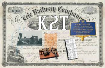 The certificate commemorates the first railroad train dispatch by telegraph in 1851. It features a background of an Erie Railroad stock certificate, early railroad symbols, the New York State historical marker about the site in Harriman of that train dispatch, as well as documentation of the on-air contact and call sign.