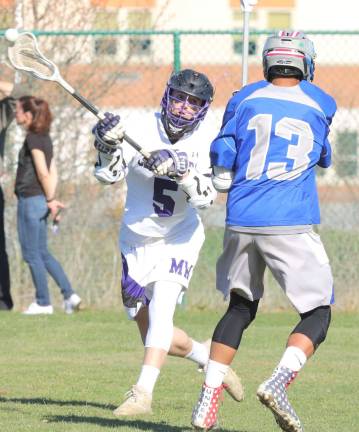 Danny Fitzpatrick (#5) bombarded the Vikings with seven goals.