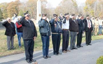 Veterans saluting during the placing of the ceremonial wreath at the Heroes’ Monument in Highland Mills on Veterans Day included Ferris Tomer, Don Blair, Bill Doyle, Fred Ungerer, Bob Cotter, Ralph Caruso and Joe Leonardi.