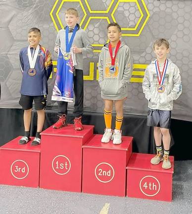 Kelly Sullivan took third place in the 12U 71 pound division.