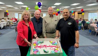 Pictured from left to right at the 25th anniversary celebration of the Monroe Senior Center are Director Ann Marie Morris, former Town Councilmen Don Weeks and Jim Rogers and Supervisor Tony Cardone. Photo provided by the Town of Monroe.