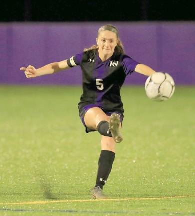 Emily Dovico (5) has helped lead the Crusaders’ defense record five shutouts this year.