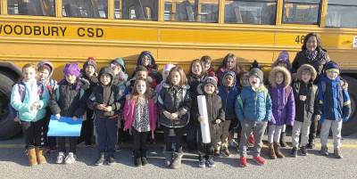 Bus 464 driver Maria Ahmad and Sapphire Elementary School students.
