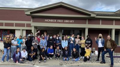 The Monroe-Woodbury National Art Honor Society (NAHS) students got into the Halloween spirit while painting the windows of the Monroe Free Library on Millpond Parkway. Photos provided by Cristina Kiesel/The Monroe Downtown Revitalization Committee.