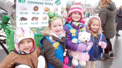 At last year's parade: Avery Rogowski, age 4, Makenna McGoldrick, age 5, Emily Tyminski, age 5, and Julia Conturi, age 5