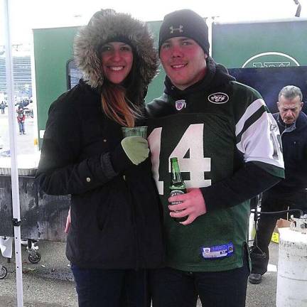 Jen and John Ellis of Monroe, N.Y. &quot;Tailgating. Feezing our butts off together!&quot;