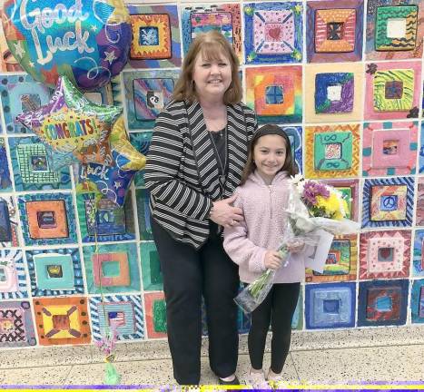 Pine Island Elementary student Gianna Henriquez with her teacher Laura Pezzola. Provided photos.
