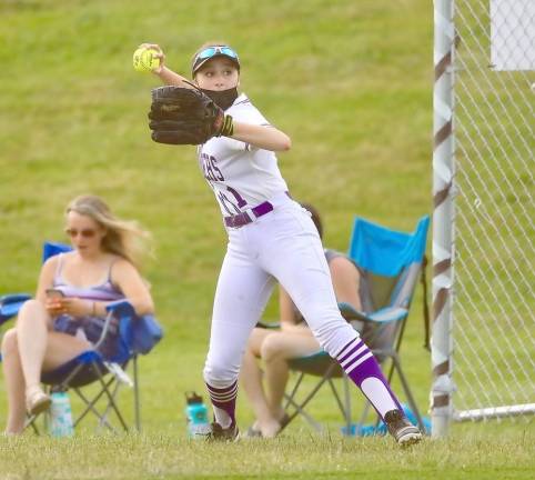 Right Fielder Natalie Welsh comes up ready after making a catch on a Wildcat foul ball.