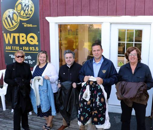 Photo by Roger Gavan From left, WTBQ Station Manager Taylor Sterling, HONOR Chief of Staff Liz Schmidt and Executive Director Chris Molinelli, Orange County Executive Director Steve Neuhaus and WTBQ owner Frank Truatt launch the &#x201c;Share the warmth&#x201d; coat drive.