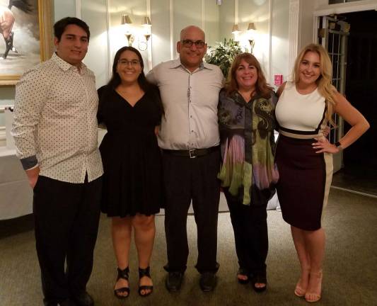 Provided photo Paul Nebrasky and family celebrate 30 years of business at anniversary dinner. Pictured from left to right are: son David Nebrasky; daughter Julia Nebrasky; Paul Nebrasky; wife Ilene Nebrasky; and daughter, Emily Nebrasky.