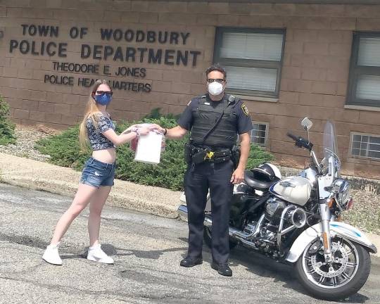 Samantha Larkin has has donated masks to the Town of Woodbury Police Department and other local police agencies.