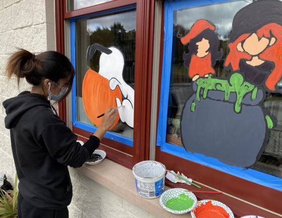 “I am so impressed with our high school art students’ talent,” Mary Duffy, the assistant director of the Monroe Free Library, said. “I am enjoying the window art every day, along with all of our Monroe Free Library patrons. The library looks so festive.