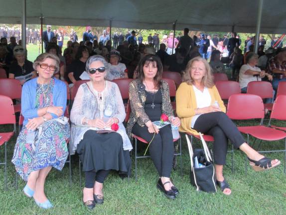 Jane Gyulavary of Warwick (second from left) lost her husband Peter on 9/11. She attended the observance with friends Agnes Magnowski, Lucia Aloi, and Liz Kiczalis.