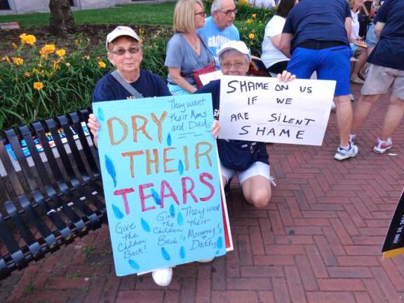 Mabel Roy (left) and Linda Gallup marching in New Jersey protesting the separation of immigrant children from their parents. “Can’t do the walking that much anymore like I was,” Roy said. “So I go the postcard route or letter to the editor route.”