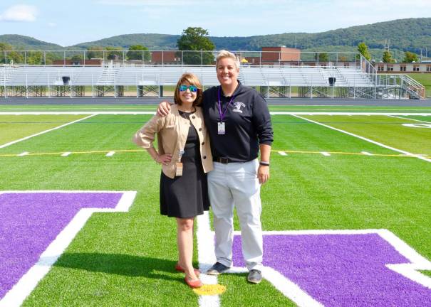 Monroe-Woodbury School Superintendent Elsie Rodriguez and Athletic Director Lori Hock share a very proud moment at the opening of the Crusader’s new multi-purpose athletic field.