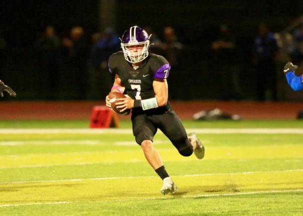 Quarterback Michael Zrelak lead the Crusaders to a 26-21 victory over the Middies
