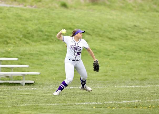 Cori Exarchakis, #23, holds the Middie runners in place after a spectacular catch in right field.