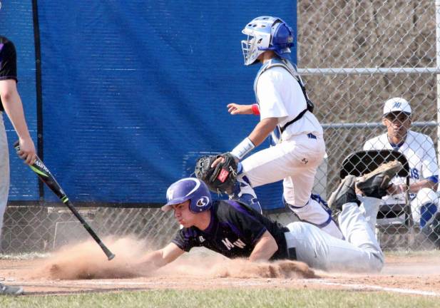 Peter Mastropolo slides home with a run in the top of the seventh.