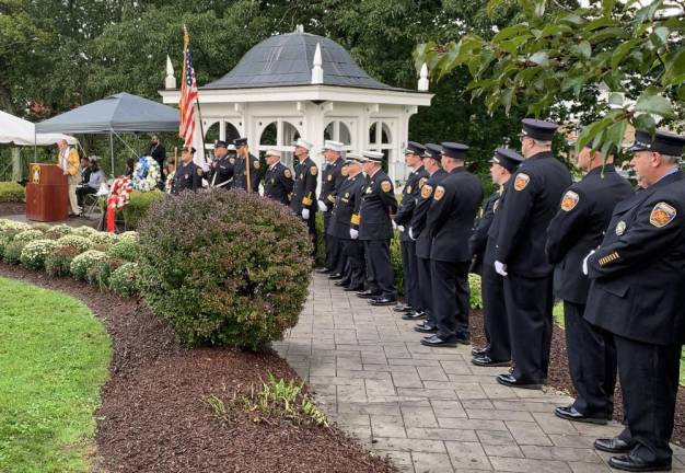 Members of the Monroe Fire Department arrived in uniform for the Village Remembrance Ceremony in Monroe on Monday, Sept. 11.