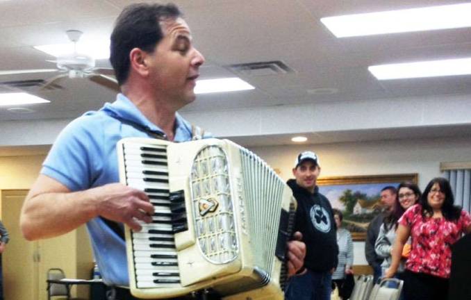 During the second of two breaks at Monday's Monroe Town Board meeting, Monroe resident Steve Pavia, a chiropractor by trade and a musician with the Mighty Spectrum Band for over 30 years, said his song &#xfe;&#xc4;&#xfa;That&#xfe;&#xc4;&#xf4;s Monore.&#xfe;&#xc4;&#xf9; has become hyper locally viral on YouTube and morphed into a demonstration of civil protest and disobedience. Photo by Bob Quinn
