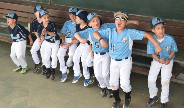 Smash players are excited to be in the Boulders' dugout: Pictured from left to right are Rocco Fazio, Chris Grote, Jackson Frambach, Brayden Bonney, Nicholas McKenzie, Rowan Durkin, Brandon Schwarz and Drew Lugo.