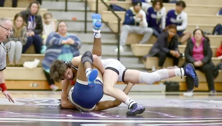 Liam Hayes top pinned his 132 lbs. opponent in 2:54. Photos by William Dimmit.