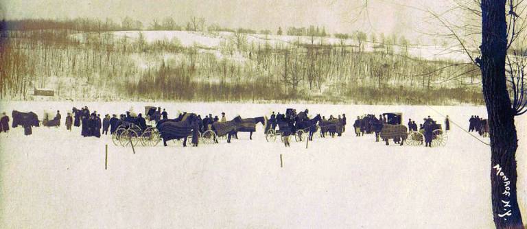 Photo courtesy of James Nelson/Monroe Historical Society This photo from 1914 shows Monrovians gatherd for horse races across a frozen Walton Lake. It might be just that cold beginning the weekend.