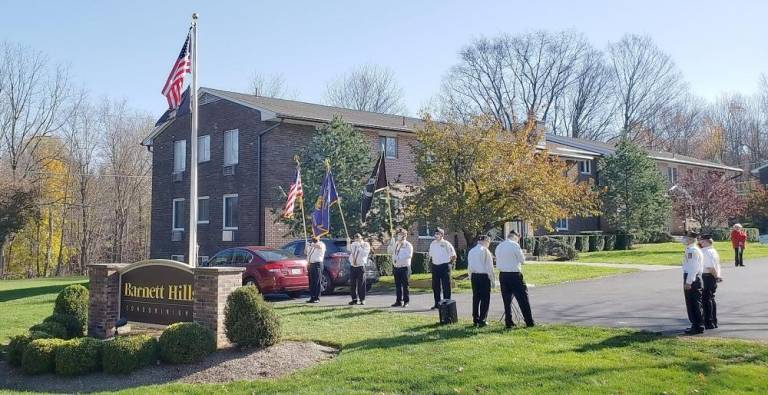 Monroe. American Legion Post 488 dedicates new Barnett Hills Condo flagpole