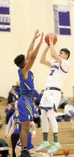 Dan Quinones gets off a jump shot in the first half.