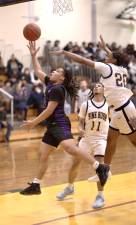 Monroe-Woodbury’s Jamir Johnson scored six in the fourth quarter to keep the Crusaders even.